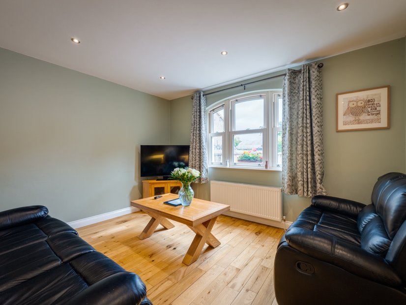 Cosy living room with leather sofas
