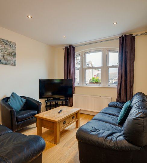 Cottage 2 living room with leather sofas